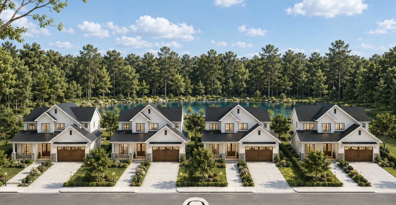 Detached homes overlooking a lake at Golden Palace Residences Uyo